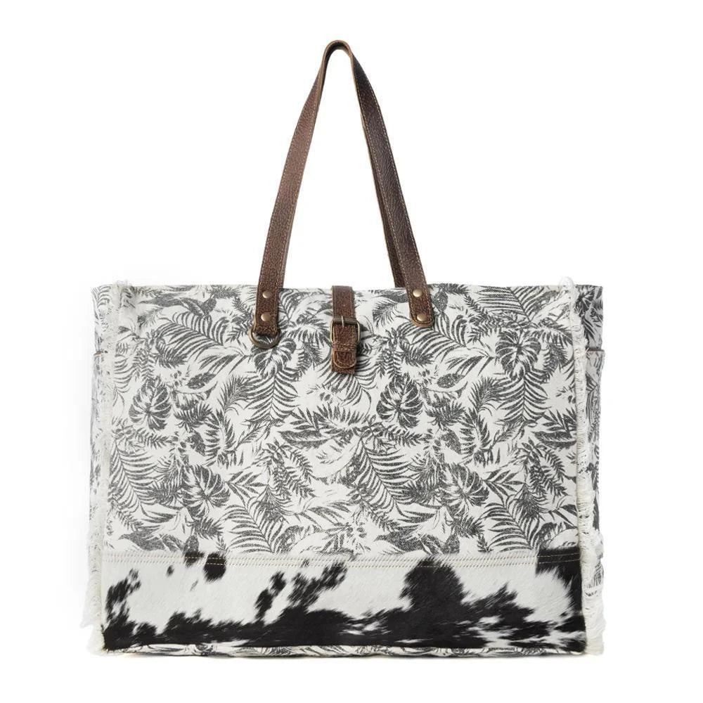 Wildfern Hide Western Weekender Bag for Women in ivory with hairon detail Wildfern Hide Western Weekender Bag for Women in ivory with hairon detail