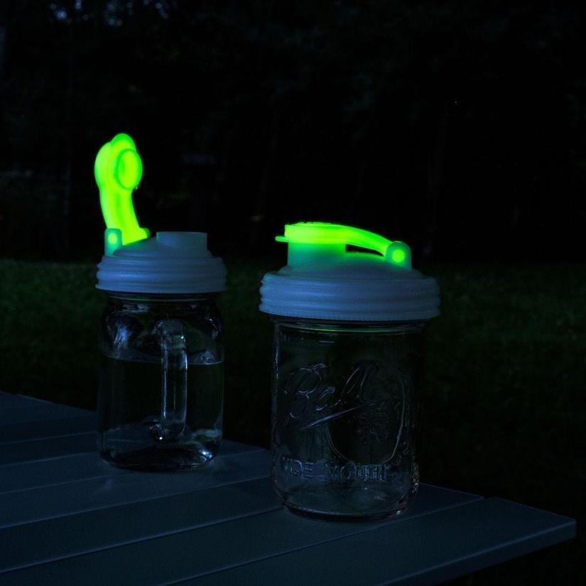 https://goldengaitmercantile.com/cdn/shop/products/mason-jars-drink-lid-with-carry-loop-glow-in-the-dark-28412949987393_1200x.jpg?v=1628538070